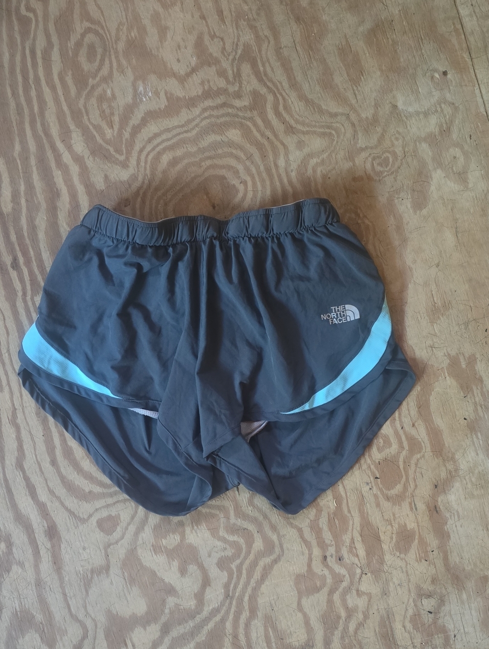The North Face Women's Black Shorts with Light Blue Accent